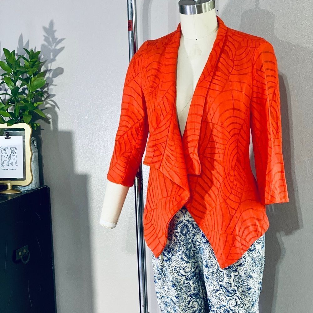 Cartise ‘Cajun shrimp’ colored jacket. Size 2